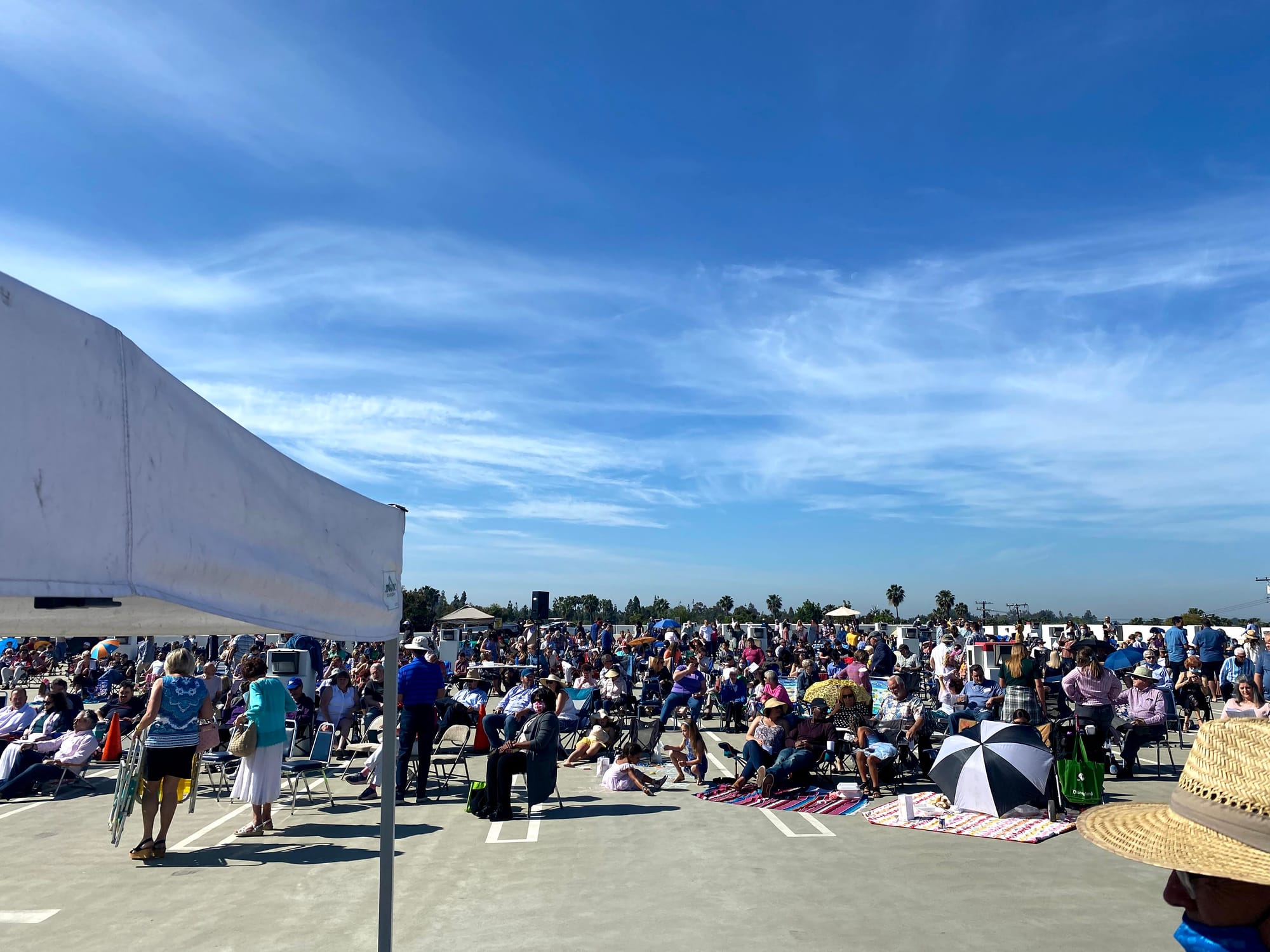 People attending Easter services on the roof of a parking structure